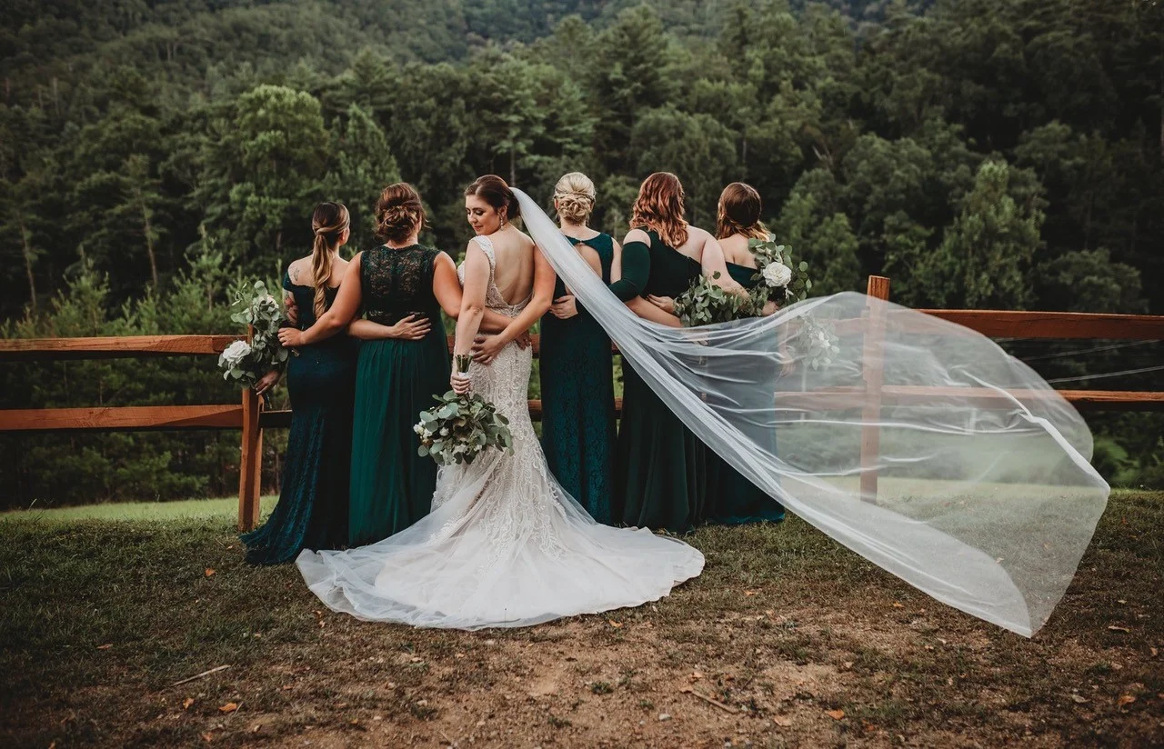 Bride and bridesmaids with Smoky Mountains views near Dollywood at Moose Hollow Lodge in Pigeon Forge